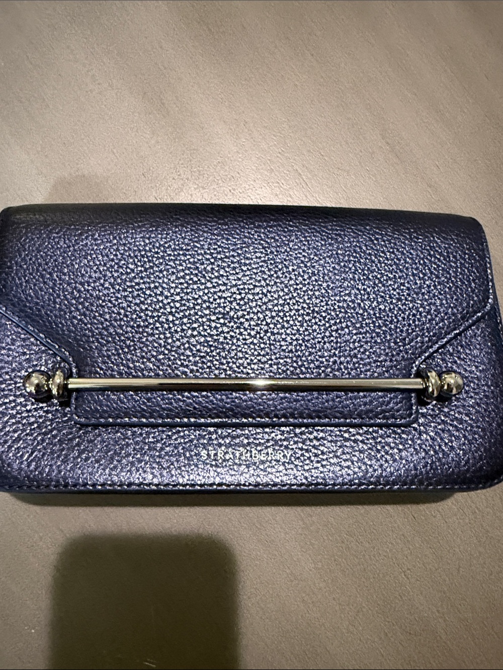 Strathberry Navy Textured Leather Mini Clutch with Gold Bar Detail